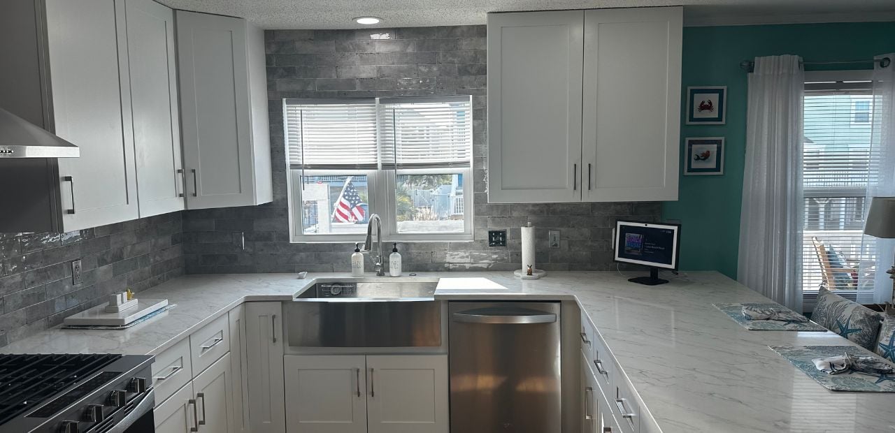 Our team completely reimagined this Holden Beach kitchen, delivering a fresh, airy design that perfectly complements its coastal surroundings.