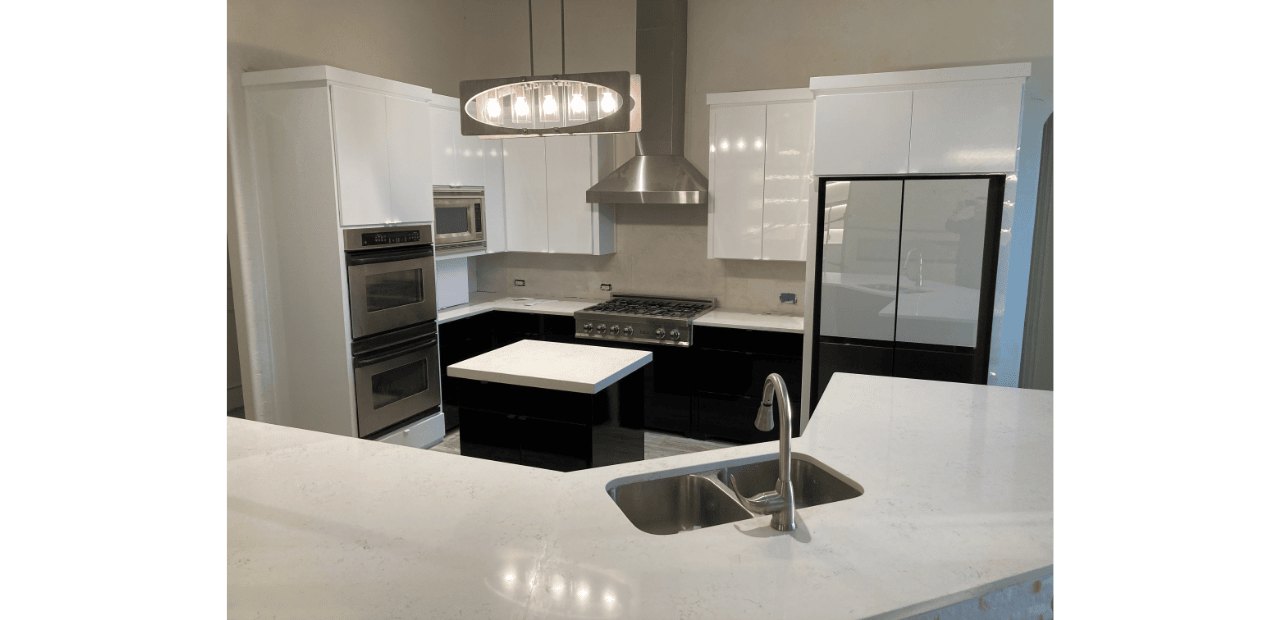 Sleek black and white modern kitchen update in North Texas with high-gloss cabinets, quartz surfaces, and stainless steel appliances by Kitchen Tune-Up