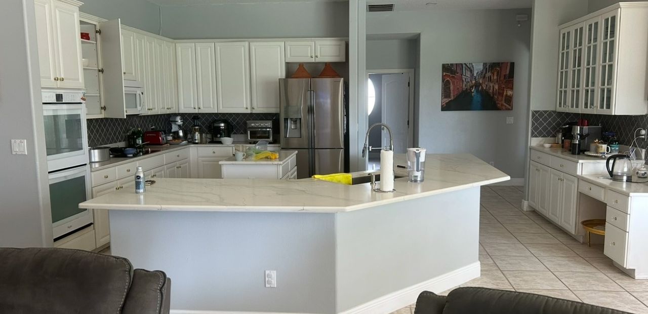 Before kitchen remodel in Windermere FL with outdated cabinets and layout