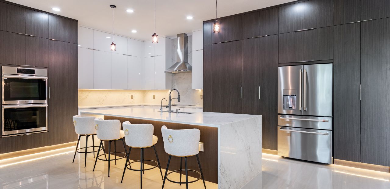 Modern kitchen remodel in Windermere FL with waterfall island and high gloss custom cabinets