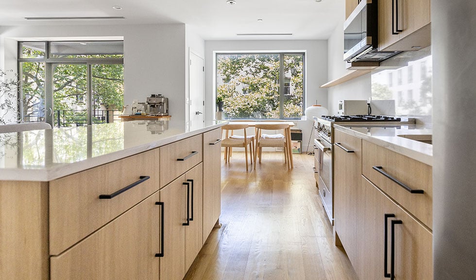 light-wood-rtf-kitchen-cabinets-quartz-countertops