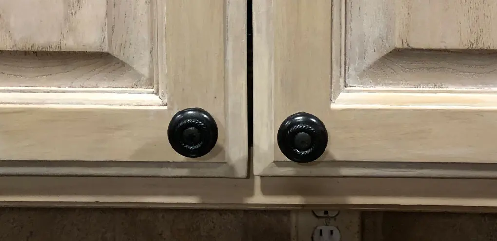 light scratched wooden kitchen cabinet 